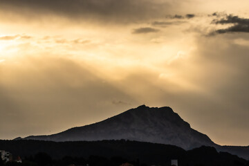 the Sainte Victoire mountain in the light of a spring morning, in cloudy weather