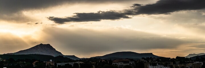 the Sainte Victoire mountain in the light of a spring morning, in cloudy weather