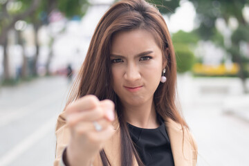 Fototapeta premium Angry asian female office worker, portrait of upset frustrated overworked business woman having job or work problem