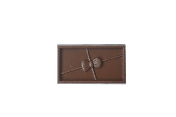 Bar of chocolate with a bow on a white background. Isolate.