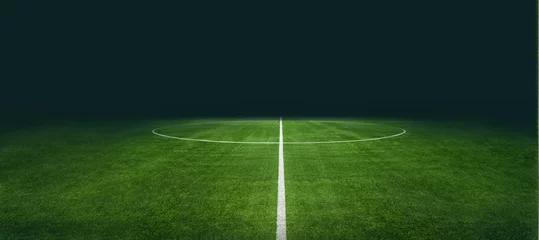 Foto auf Acrylglas textured soccer game field with neon fog - center, midfield © Igor Link