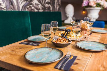 Served restaurant table - Close up of dishware and food on restaurant table