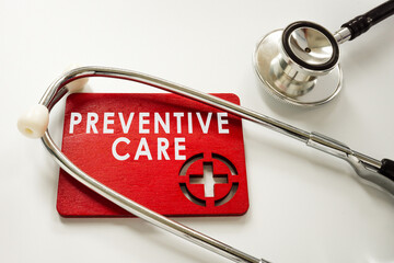 Sign preventive health care and medical stethoscope. - obrazy, fototapety, plakaty
