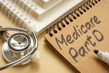 Notepad with words medicare part D and stethoscope. - obrazy, fototapety, plakaty