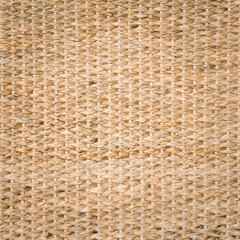 brown pattern made from reed weaving, close up details, surface of water hyacinth weave , abstract background