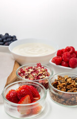 Ingredients for a healthy breakfast. Muesli, berries and yogurt. Healthy eating. Sports fitness menu.High quality photo