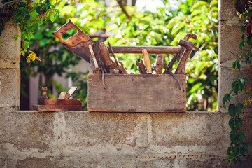 vintage tool box stand on table green background