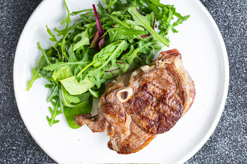 meat grill bbq hot steak fresh salad beef on the bone lamb or beef snack trend meal copy space food background rustic. top view
