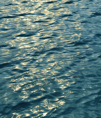 Water surface texture. Background of underwater. Rippled blurred texture of water. 
