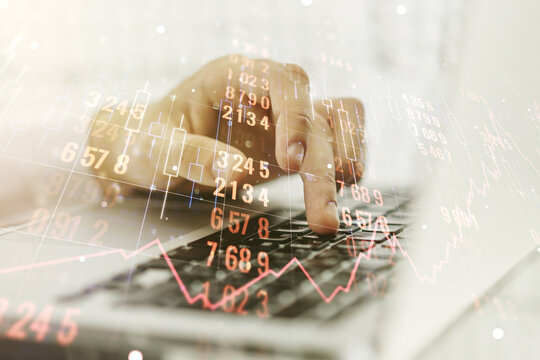 Double exposure of abstract creative statistics data hologram with hands typing on laptop on background, statistics and analytics concept