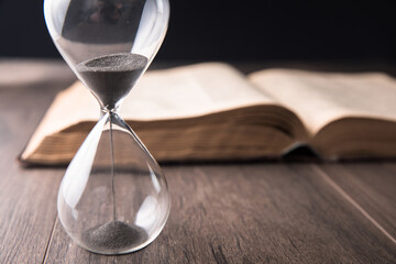 Hourglass countdown with a book
