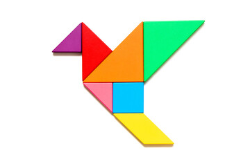 Color tangram puzzle in flying bird shape on white background