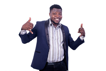 young businessman showing cellphone gesture with hands while smiling.