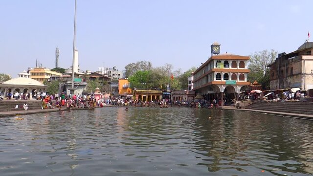 Pilgrims taking a holy bath in holy river Godwari river 