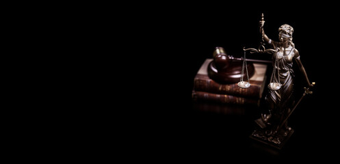Legal and law concept statue of Lady Justice with scales of justice, gavel and law books black background - obrazy, fototapety, plakaty