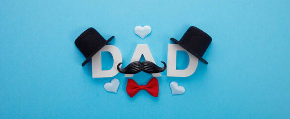 Father's Day banner with word Dad mustache and hats on blue background