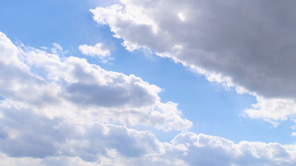 Beautiful blue spring sky with wind-blown clouds	