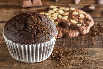chocolate muffin on a wooden table