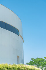 Fototapeta premium Exterior of a remodeled oil tank, modern architecture in Shanghai, China.