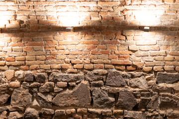 Masonry of generations of stone and brick. In the basement, the old part of the building was excavated from rough stones before the appearance of bricks.