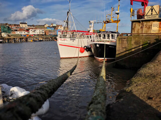 Fototapeta na wymiar Boats Moored in harbour