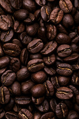 Brown roasted coffee beans. Closeup shot of coffee beans.