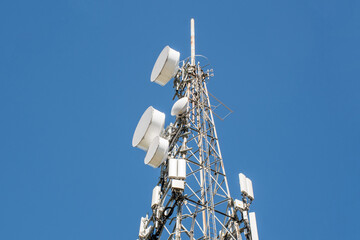 Radio, communication and cell tower on blue sky background - Powered by Adobe