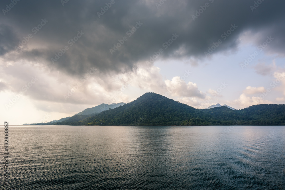 Sticker Sea and island with the rain cloud background