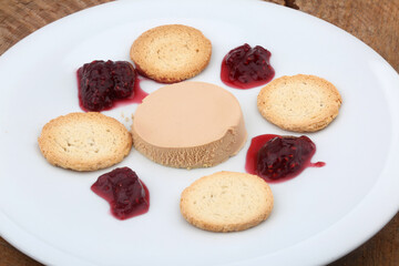 duck liver with toast and red fruits jam