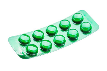 Pills in a blister pack of green color isolated on white background. Antidepressant and Healing Concept.