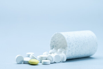 Medical and pharmacy backgrounds with drugs over the desk