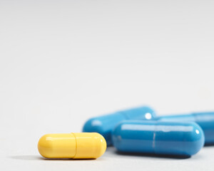 Medical and pharmacy backgrounds with drugs over the desk