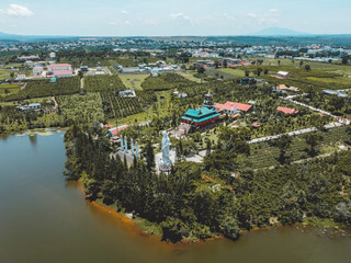 Aerial view of Hoa Nghiem Pagoda in Bao loc city, Lam Dong province, Vietnam. This pagoda is located on Bao Lam lake.
