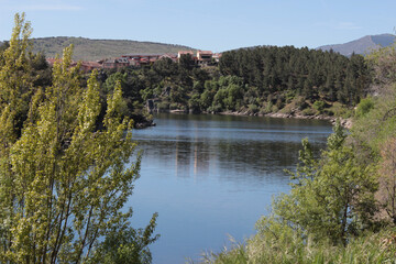 Fototapeta na wymiar Lozoya river arriving to the medieval village of Buitrago de Lozoya.