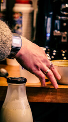 Barista making a coffee.