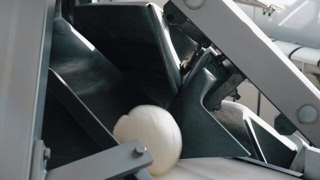 The dough rolls into a ball and leaves