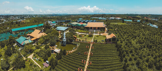 Aerial view of Tea Pagoda (Vietnamese language is Chua Tra) in Bao loc city, Lam Dong province, Vietnam. This pagoda is located on Nam Phuong lake