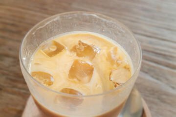 Morning coffee latte on wood desk work from home office