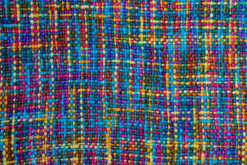 Multicolored wool knitted fabric texture as background