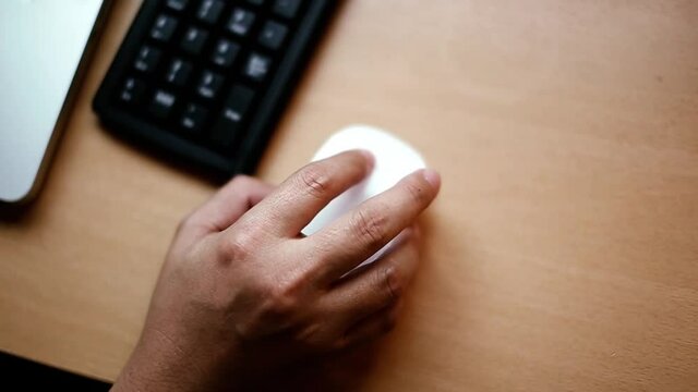 Top of view hand on mouse  to click