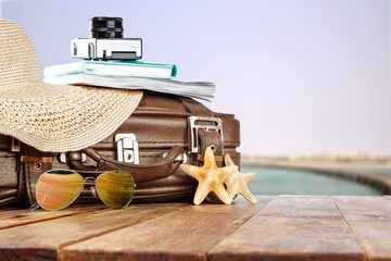 Summer suitcase and free space for your decoration 