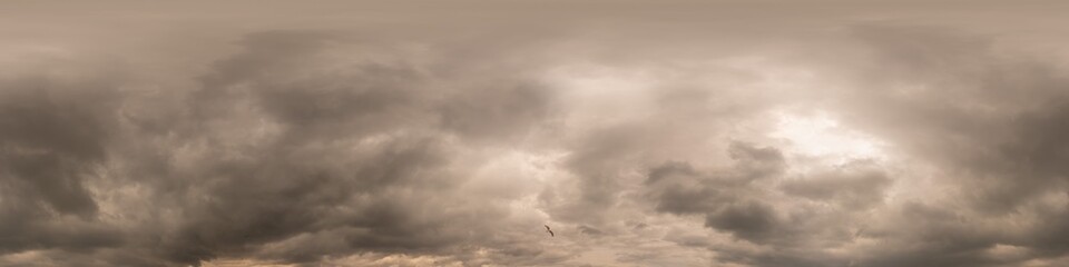 Overcast sky panorama on sunset with Cumulus clouds in Seamless spherical equirectangular format as full zenith for use in 3D graphics, game and aerial drone 360 degree panoramas for sky replacement.