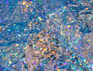 Diamond texture with shining and colorful crystals. Elegant, luxurious wallpaper.