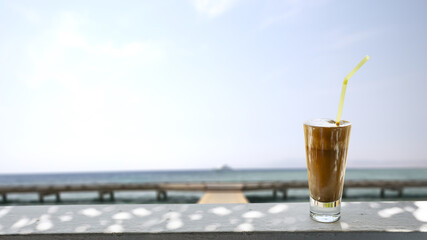 Coffee on summer beach and free space for your decoration. 