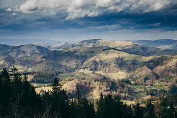 A canyon with a mountain in the background
