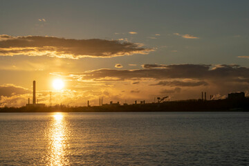 Naklejka premium Industry in a city by the river. Ecological concept.