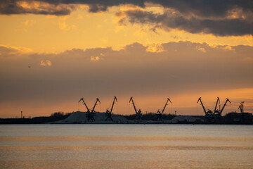 Metallurgical industrial plant on the river bank.