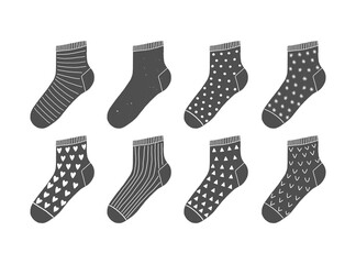 Set of 8 cute vector black socks with ornaments on white background. Scandinavian doodle illustrations.
