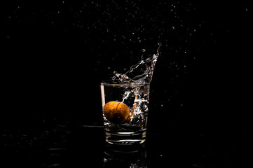 High resolution water splash freeze motion from a clean glass of water