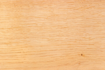 Fototapeta premium Background of the light colored oak plank, close-up